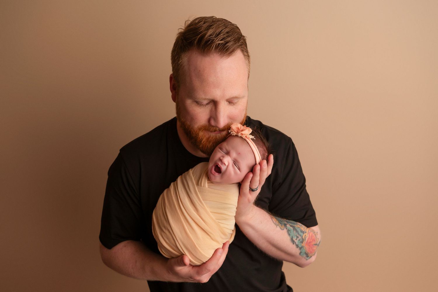 Series of candid moments showing parent interacting with newborn against beige background.
