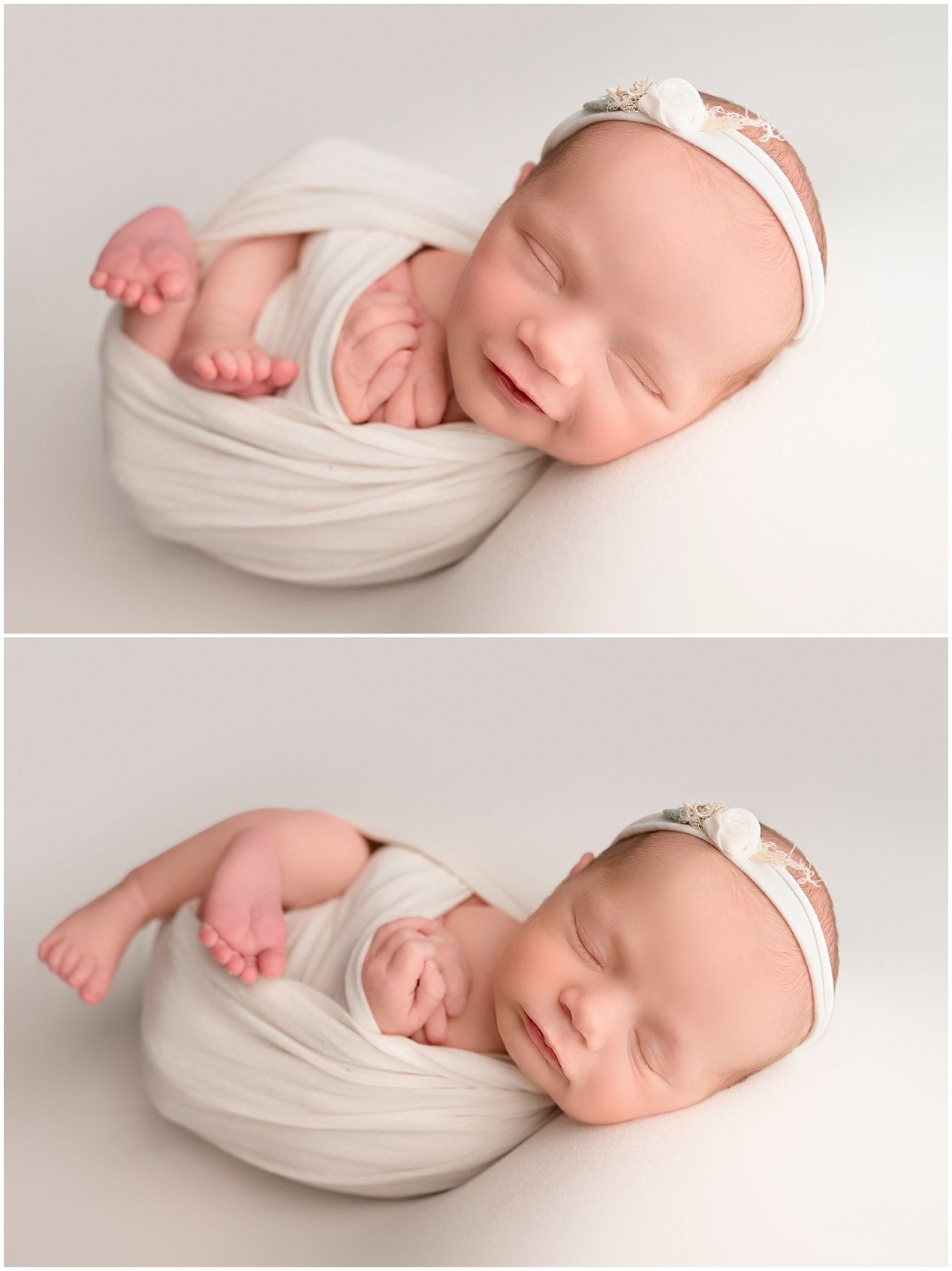 A sleeping newborn wrapped in soft white fabric with a delicate headband lying on a light backdrop.