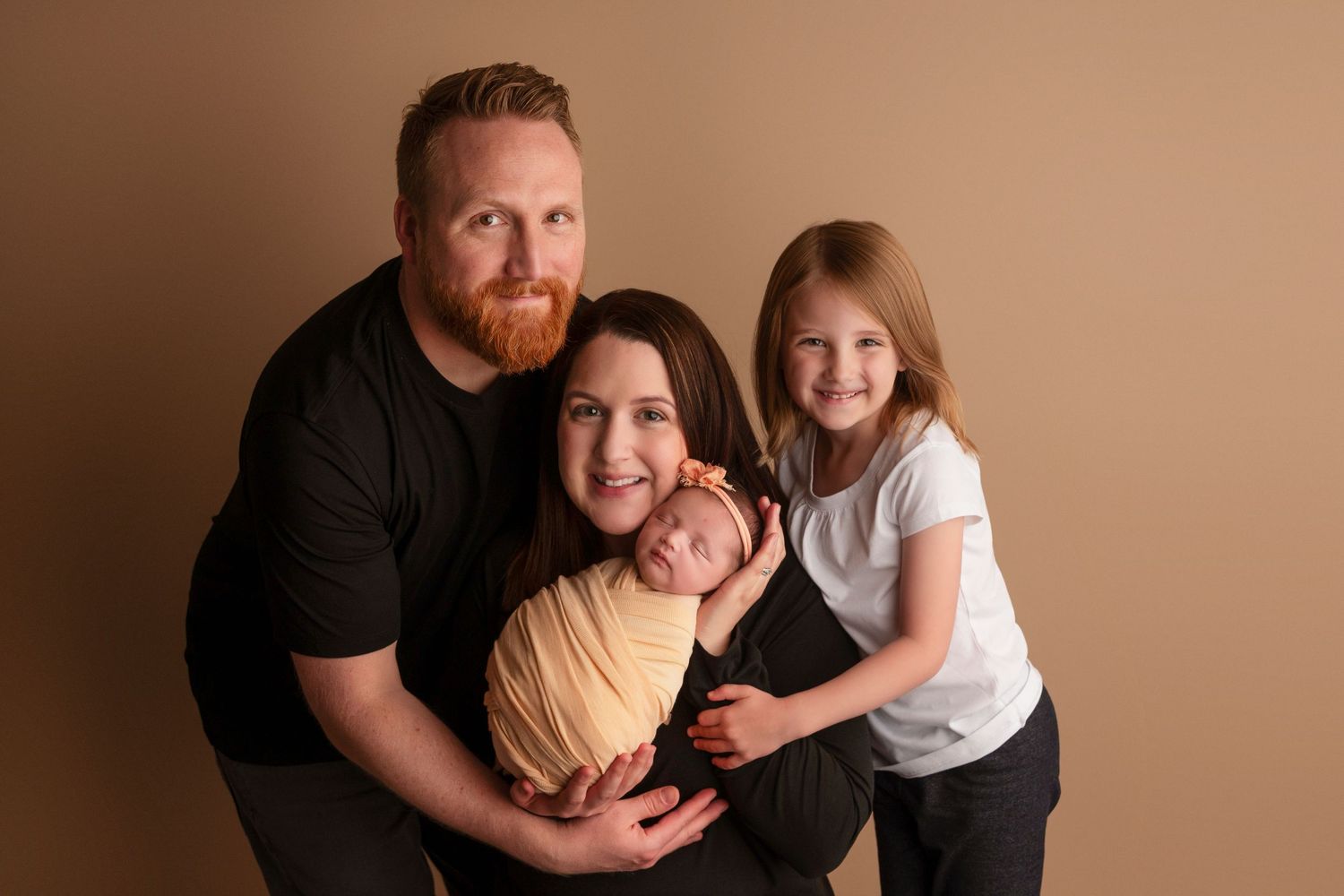 A collage of family photos with warm brown tones showing tender moments between parents and children.