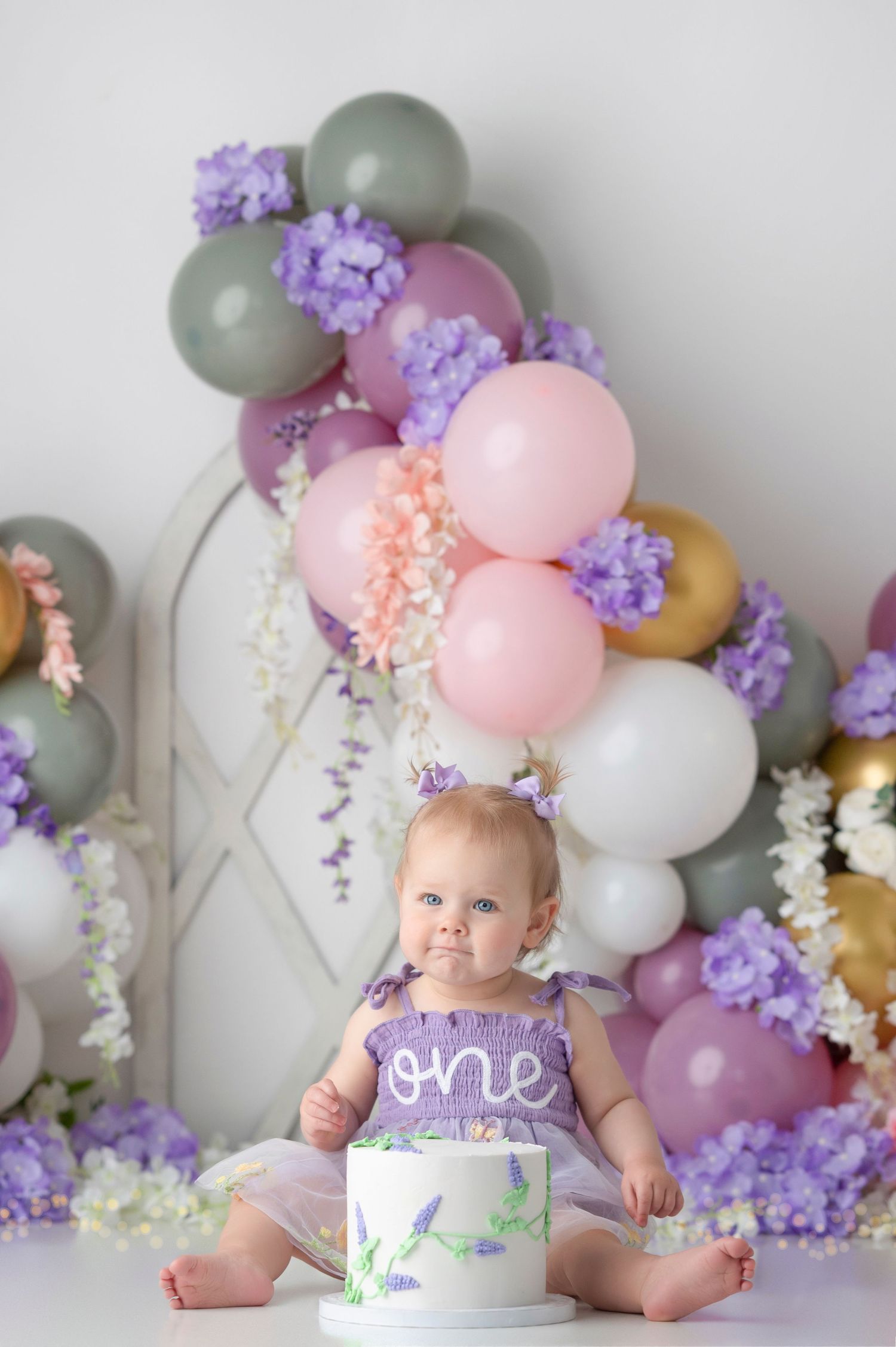 Baby girl in purple \
