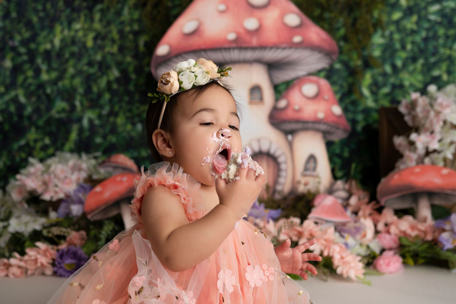 A whimsical photoshoot series featuring a pink mushroom-themed set with floral decorations.