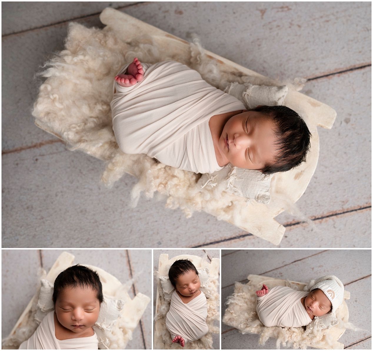 Newborn baby sleeping on soft white blankets and textured fabric in a peaceful studio setting.