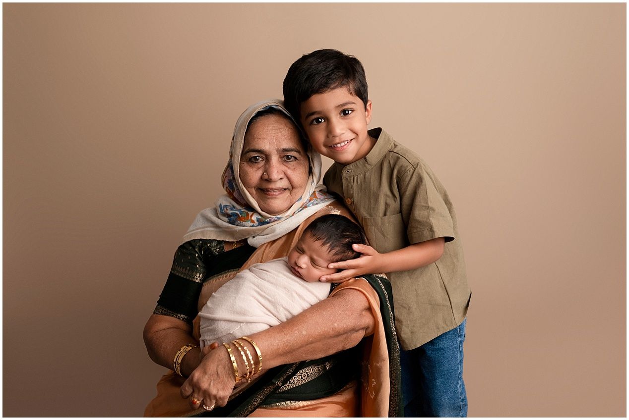 A series of intimate family photos showing warm embraces and joyful moments together in warm sepia-toned lighting.