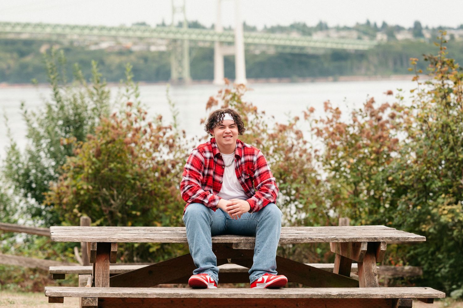 A series of photos showing someone sitting on a wooden bench overlooking a scenic waterfront view.