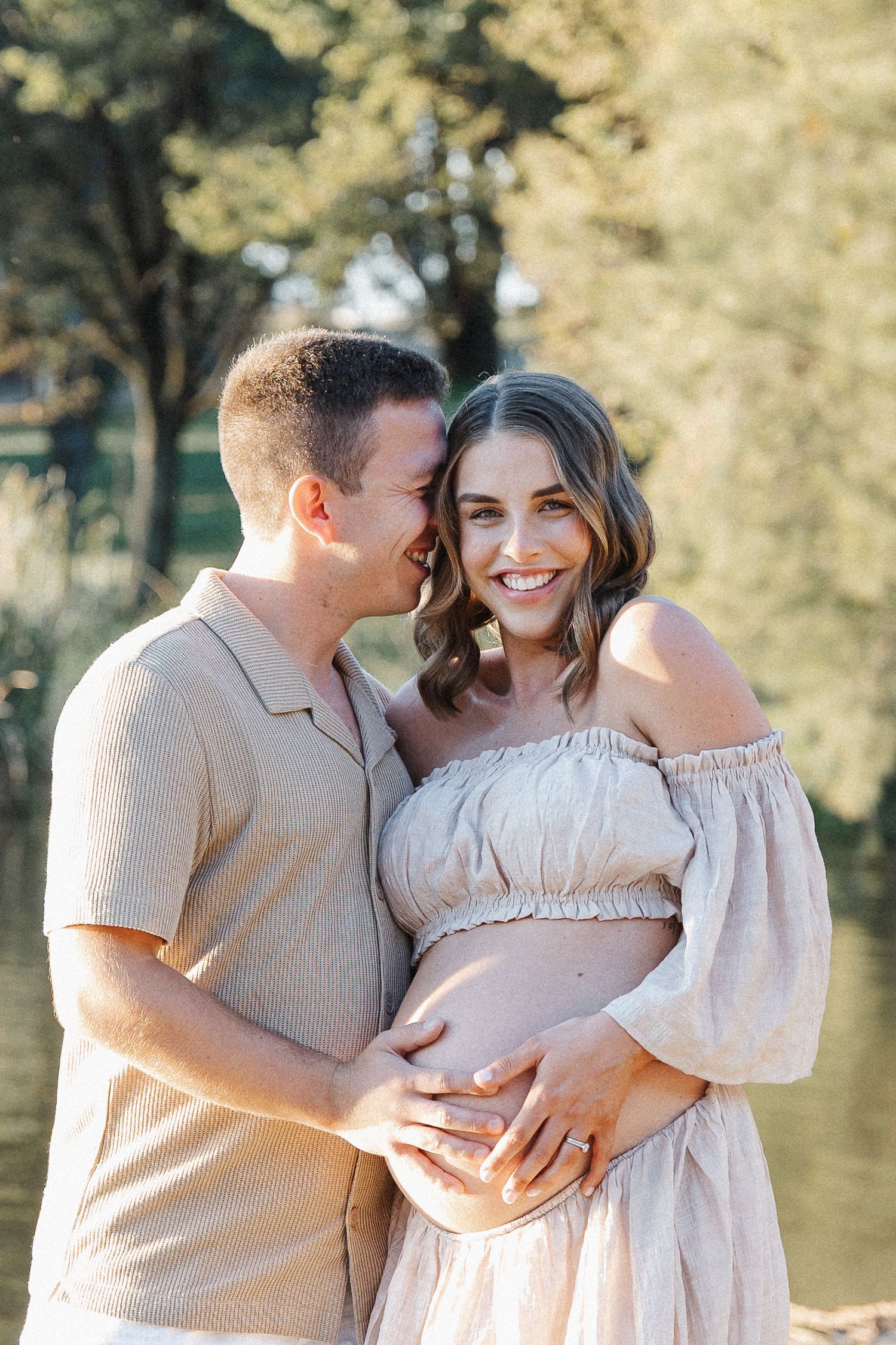Excited happy couple awaiting their baby in Canberra maternity photoshoot