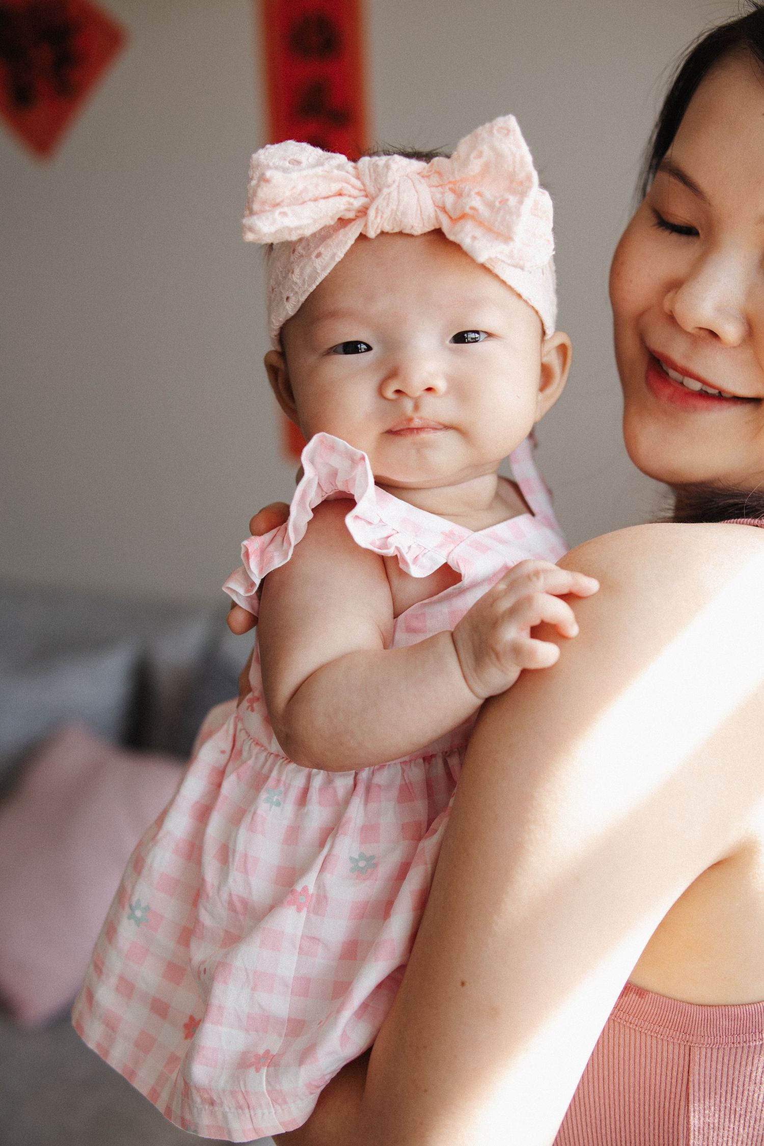 Baby girl with her mother in family photoshoot in Canberra