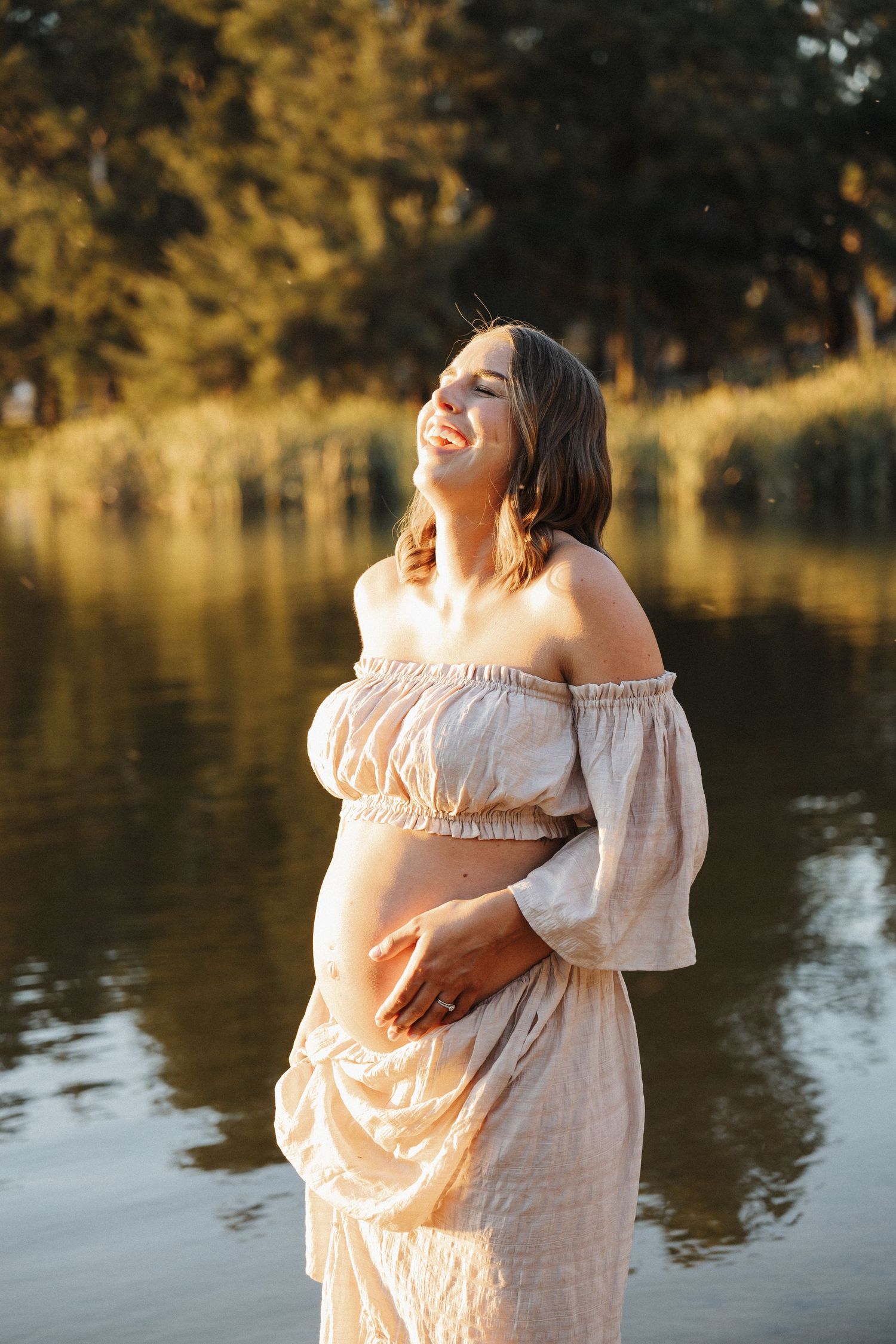 Laughing and fun at maternity photoshoot in Canberra