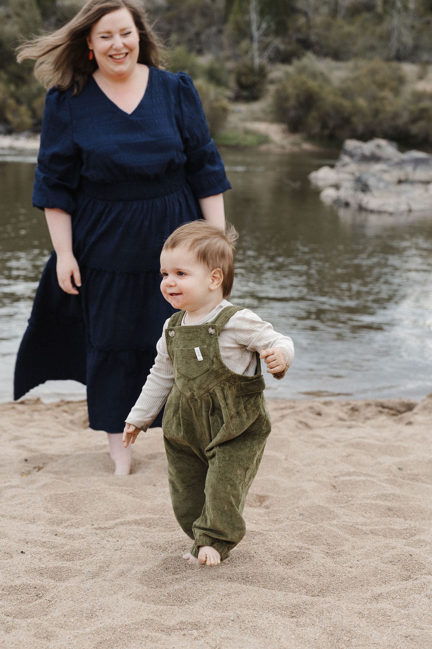 Running toddler on the beach in Canberra family photo session