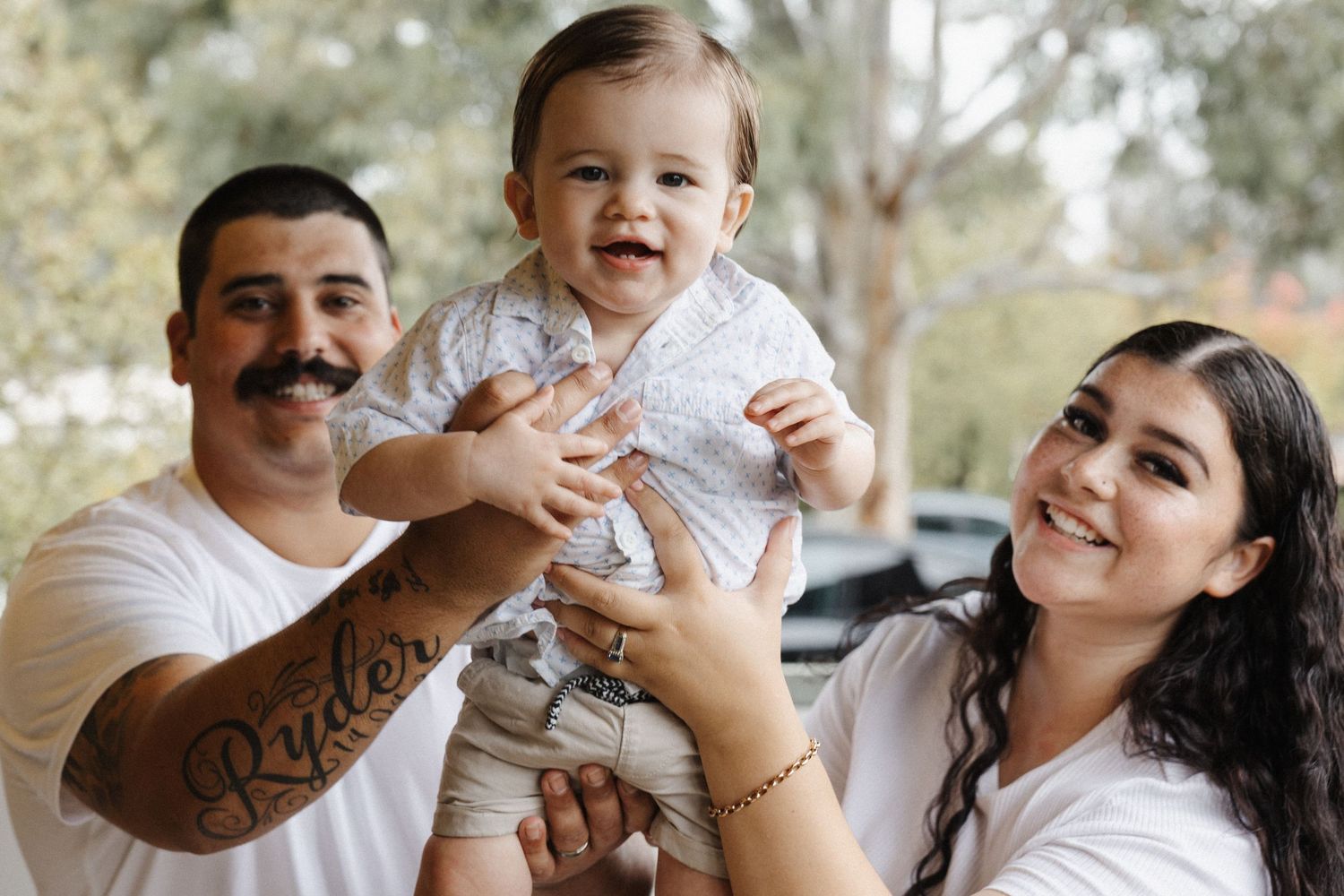 Couple throw their baby in Canberra family photoshoot