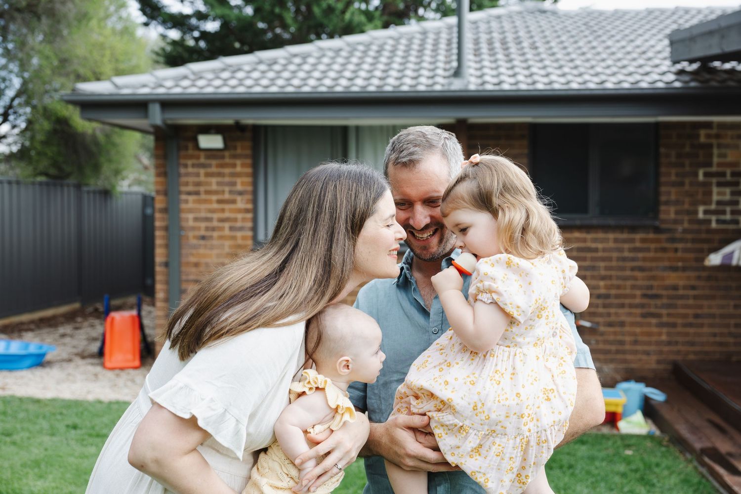 Mum pretends to steal a toddler's ice cream during Canberra family photoshoot