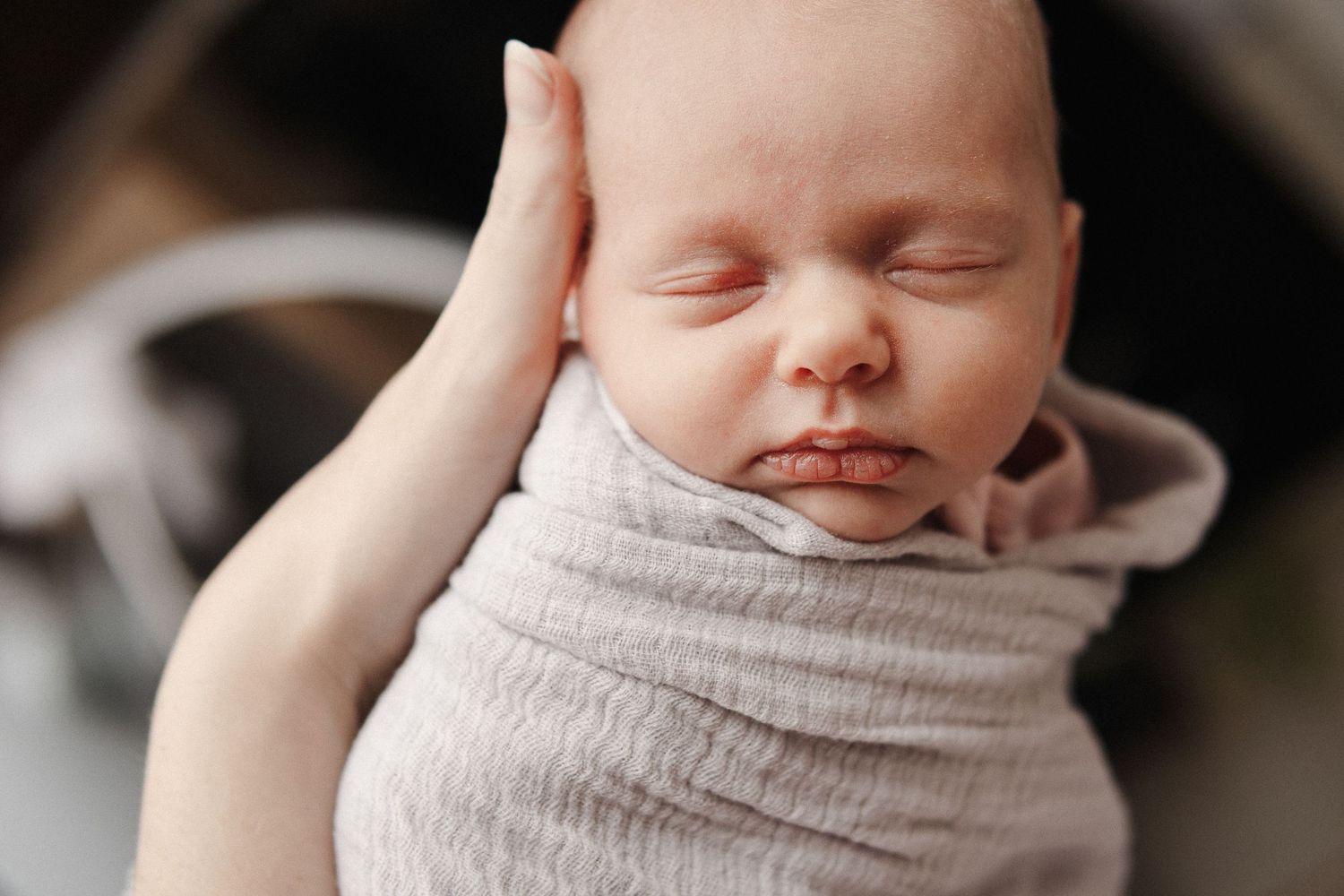 Newborn baby sleeping peacefully in Canberra