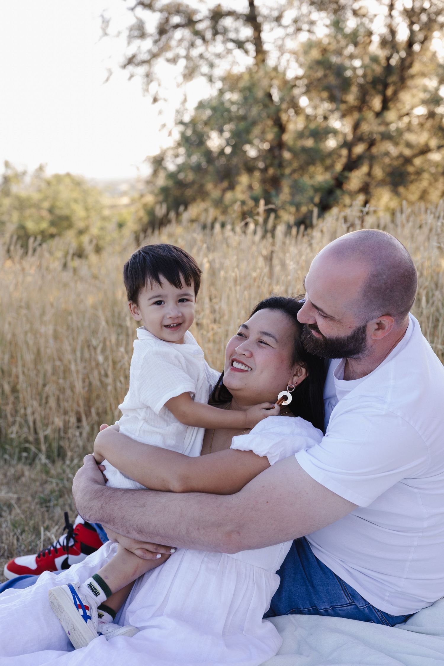 Family playing outdoors in Canberra family photo session