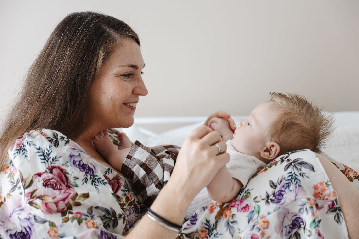 Mum plays with baby in Canberra photography studio