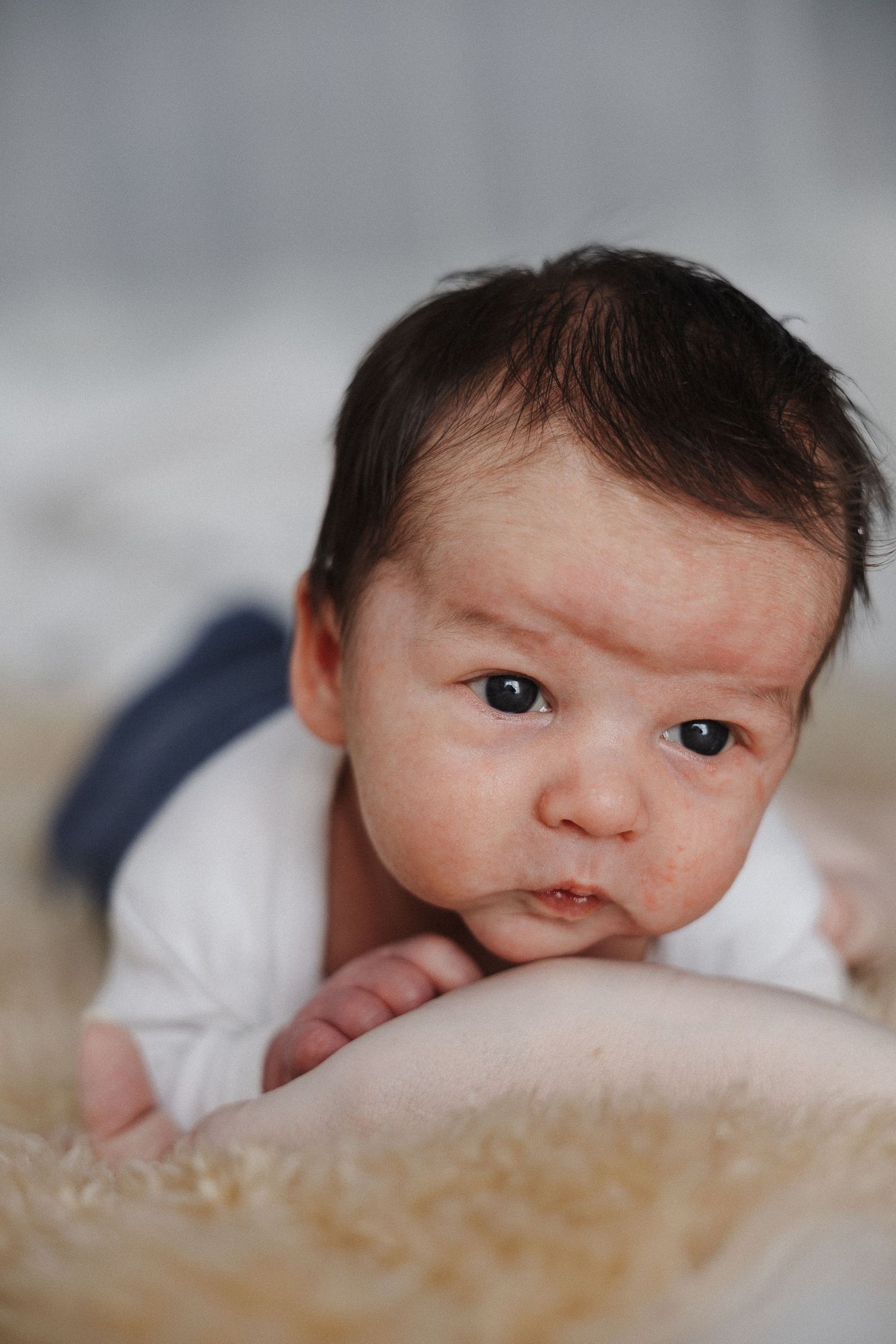 Tummy time for a newborn baby in Canberra studio