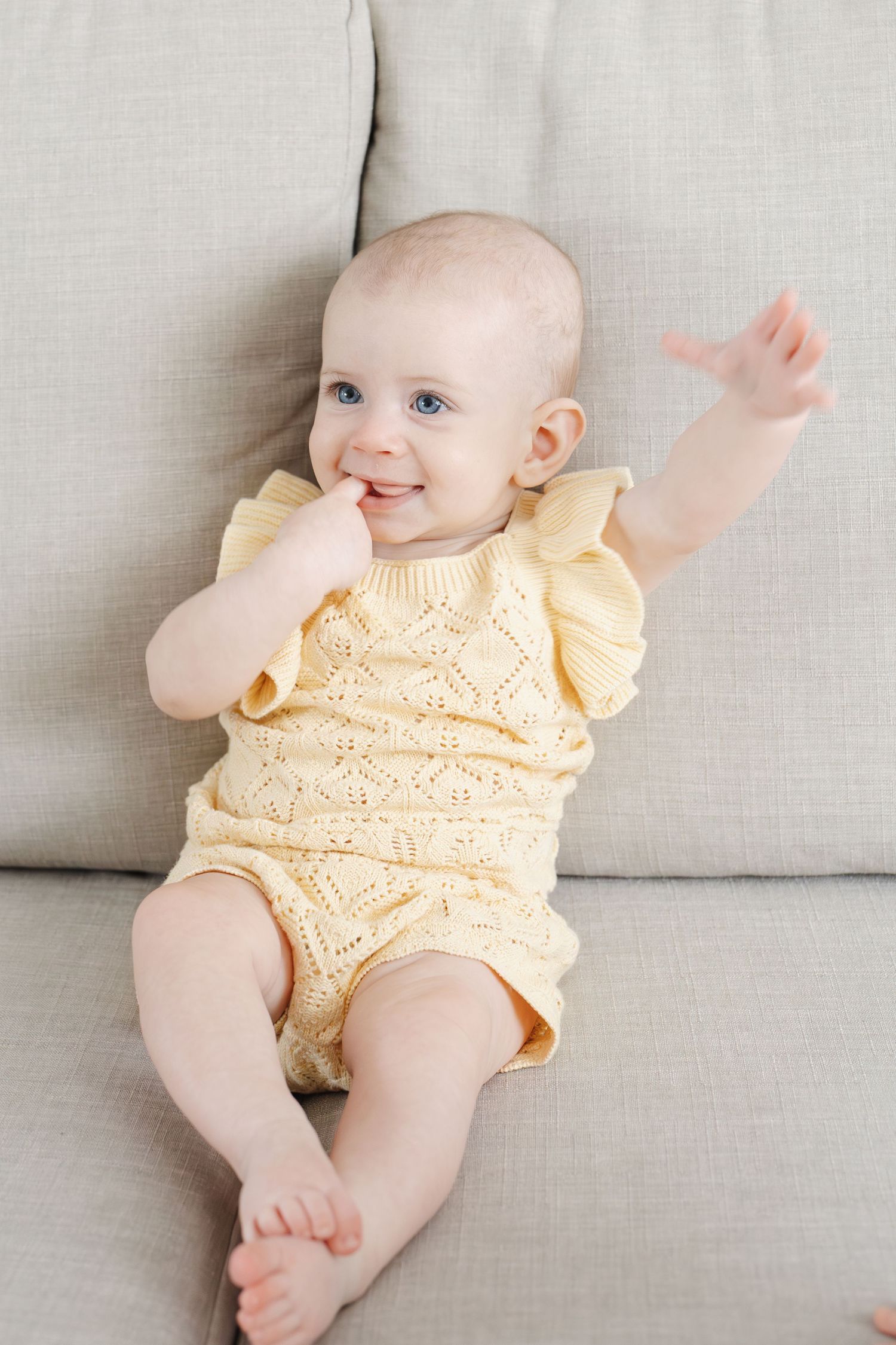 Baby girl smiles during Canberra family photoshoot
