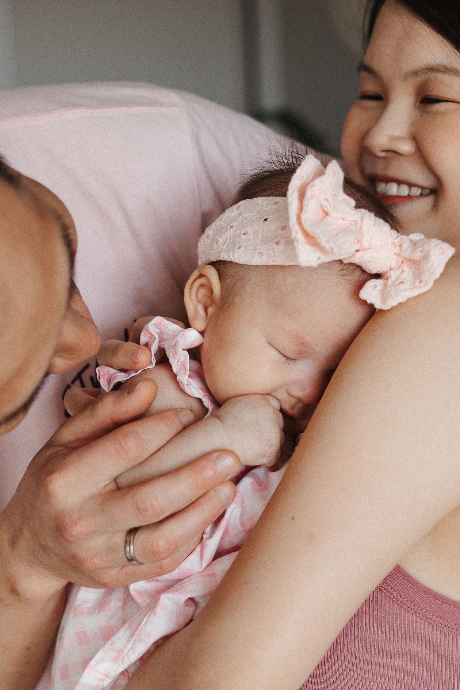 parents with their shy baby girl in Canberra family photoshoot