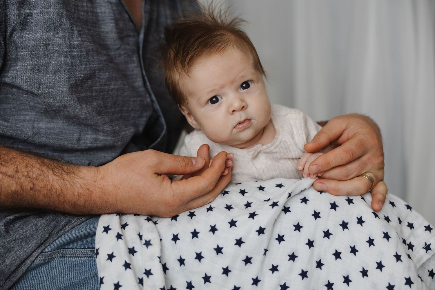 A newborn baby in a newborn photoshoot in Canberra