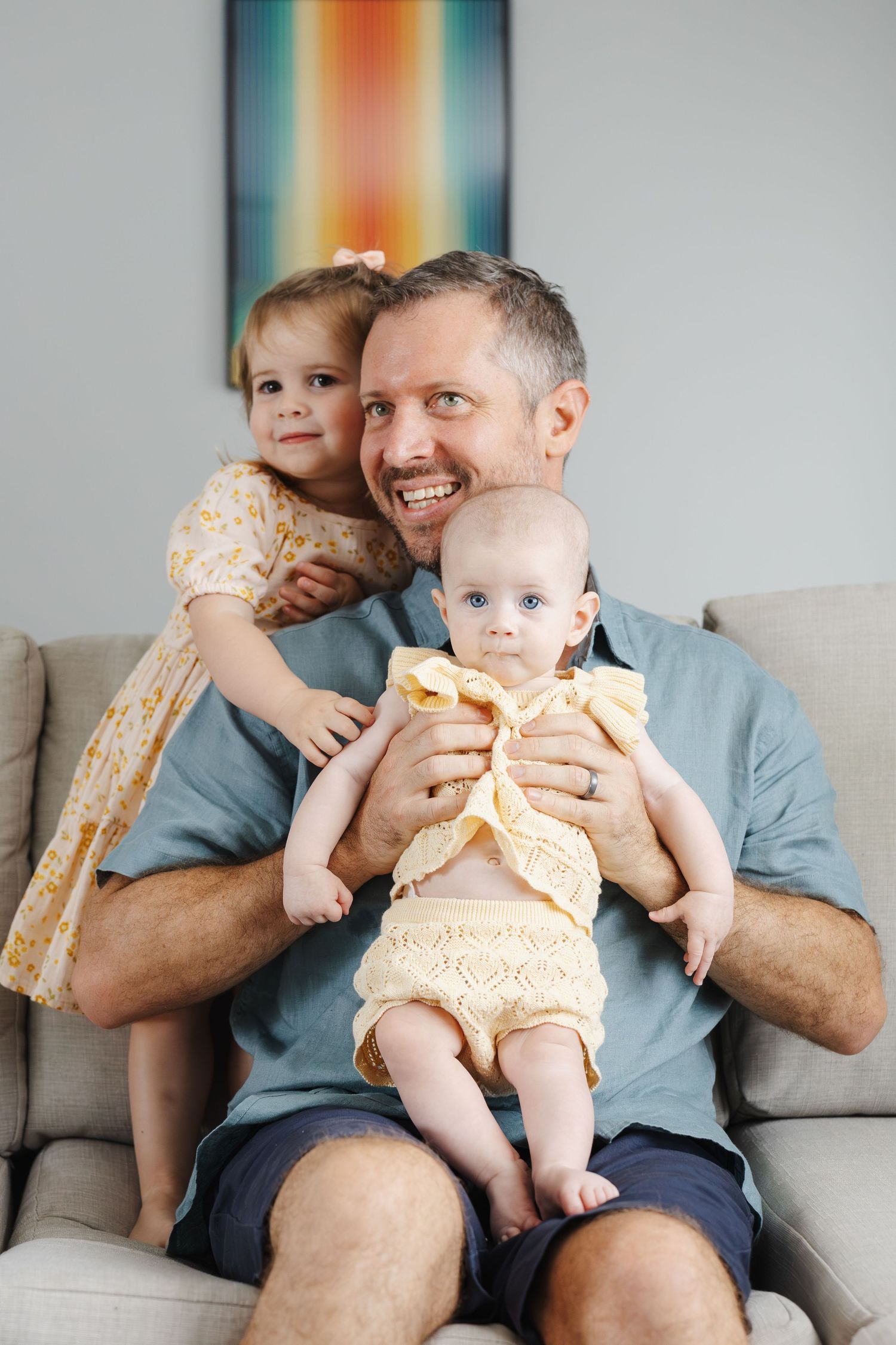 Hugs for dad during Canberra family photoshoot