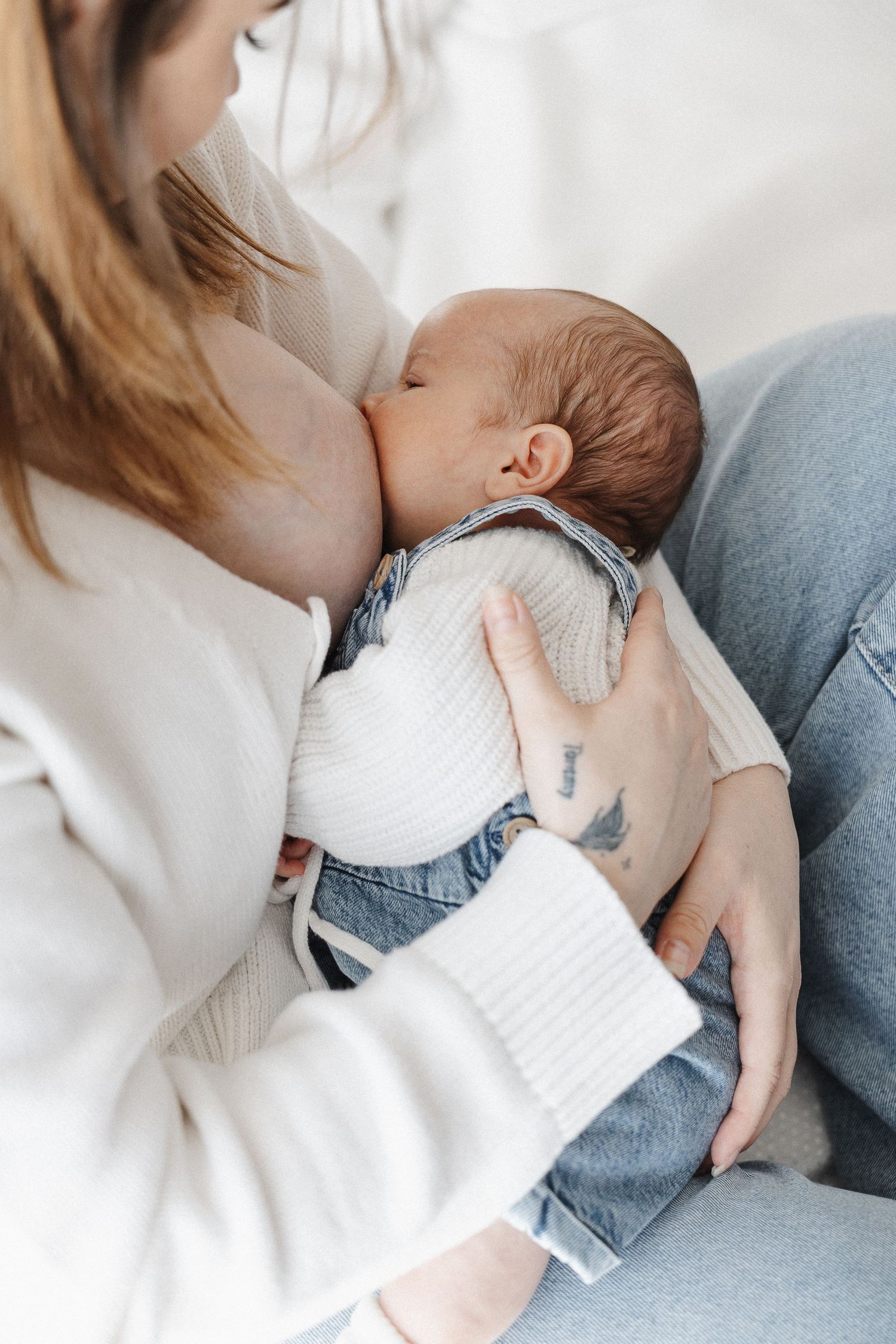 Newborn baby breastfeeding in Belconnen Canberra photography studio