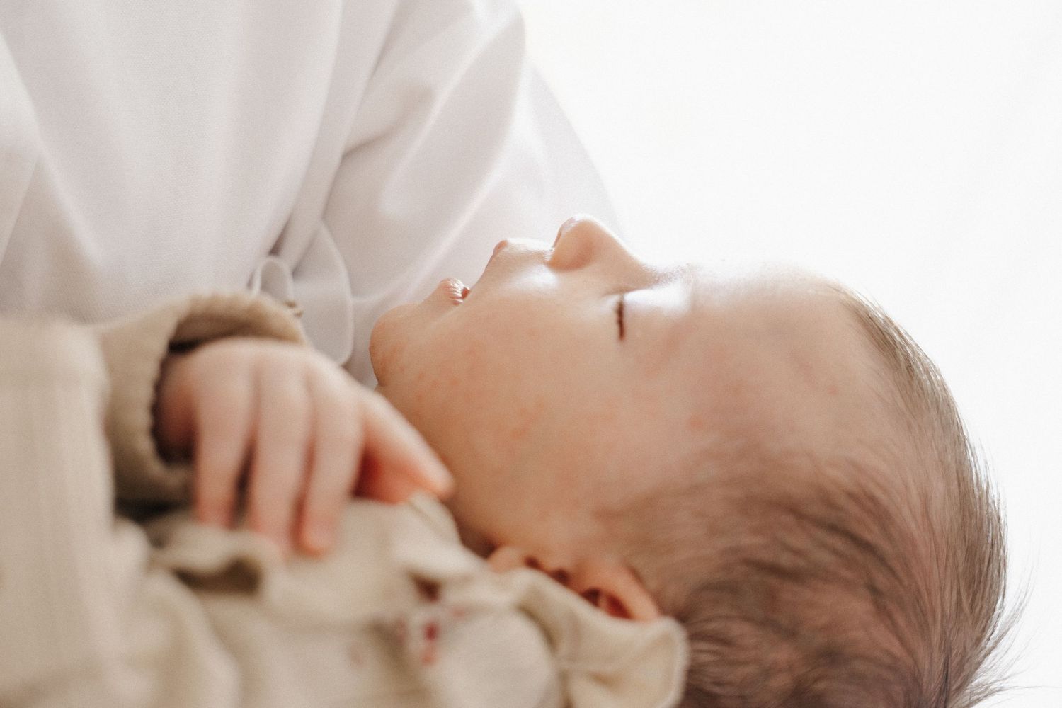 Profile of peacefully sleeping newborn baby in Canberra