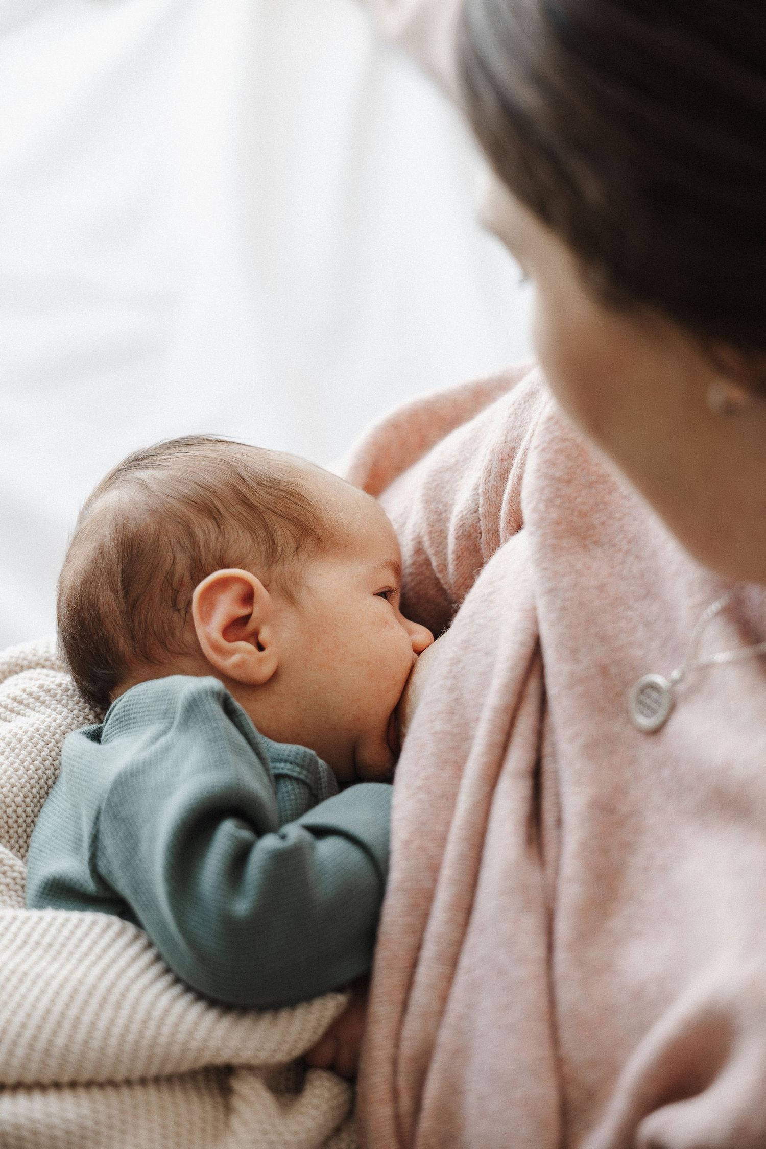 Newborn baby breastfeeding in Belconnen Canberra photography studio