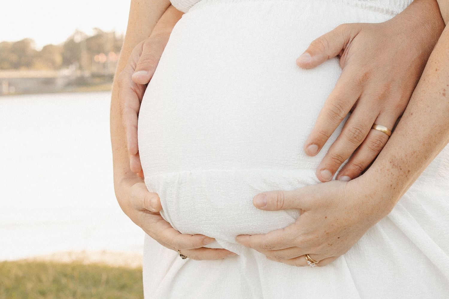 Pregnant belly in photoshoot with Canberra couple