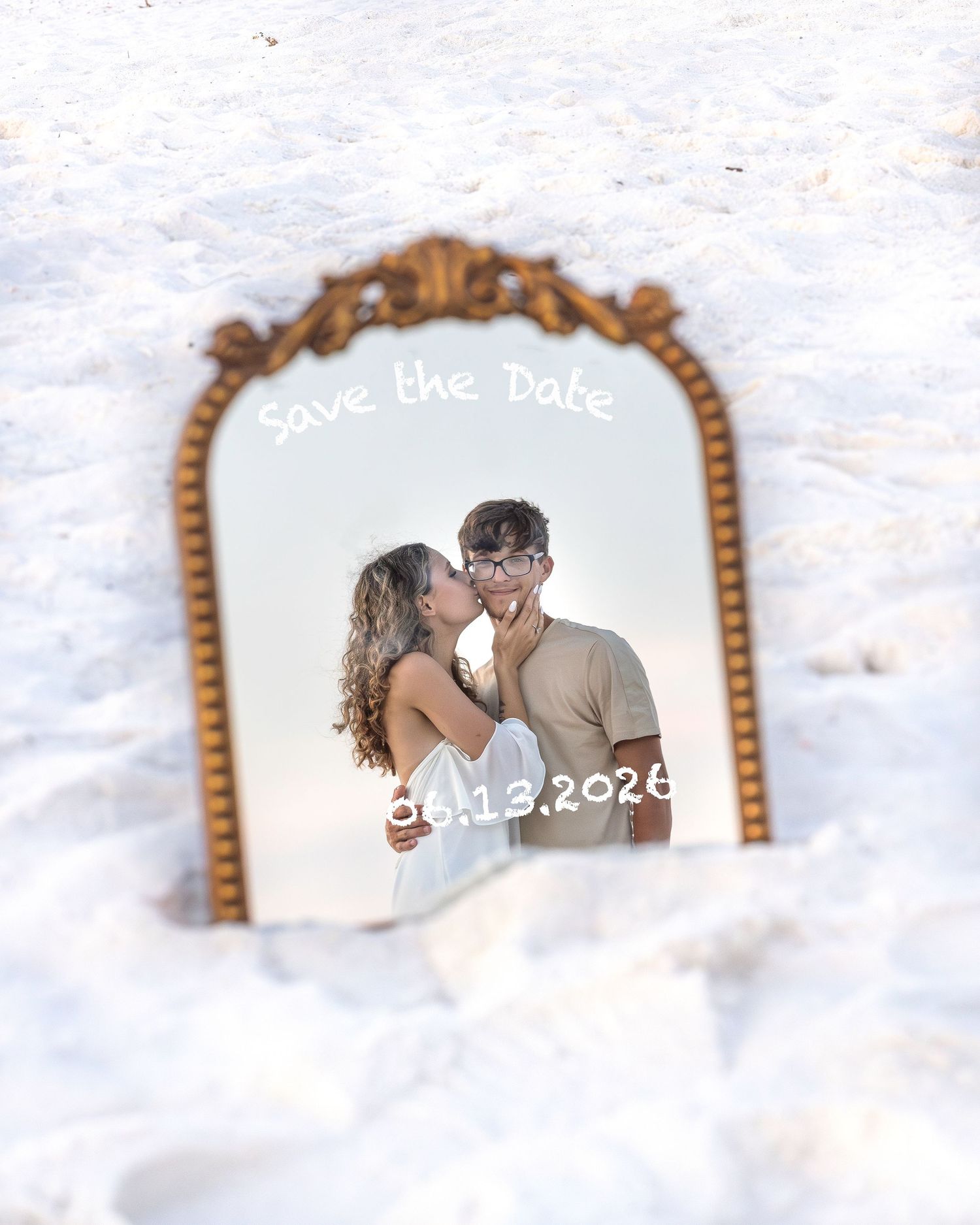 A romantic save-the-date photo series showing a couple embracing in an ornate gold frame against a snowy backdrop.