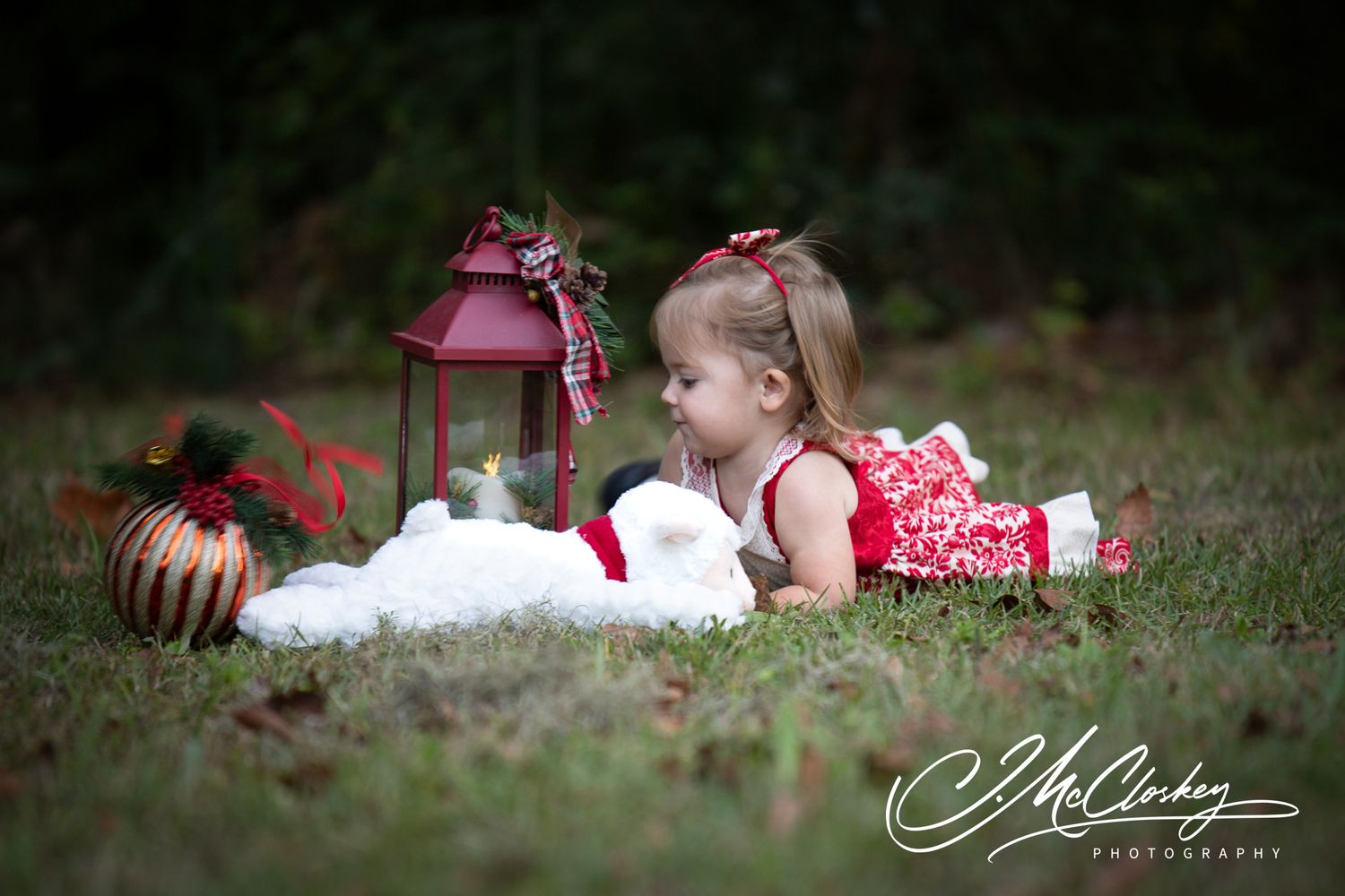 A series of outdoor photos taken in grass showing people sitting in red and white outfits creating a harmonious composition.