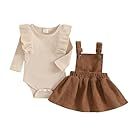 Set of vintage-style children's dresses and outfits in cream and brown tones.