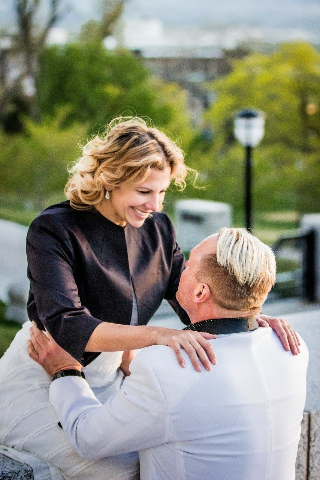 Romantic moment shared between couple during outdoor photoshoot.