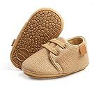 Tan leather baby booties and shoes displayed in ascending size order.