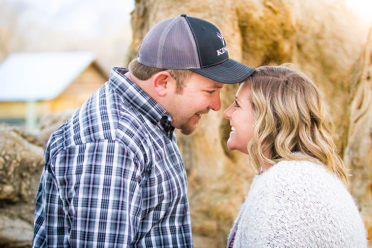 Intimate close-up portraits captured against golden sunset lighting.