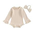 Beige baby clothing collection with ruffled details and matching accessories.