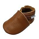 Brown leather baby shoes and moccasins displayed in a horizontal line.