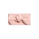 Pink baby accessories and clothing items displayed on white background.