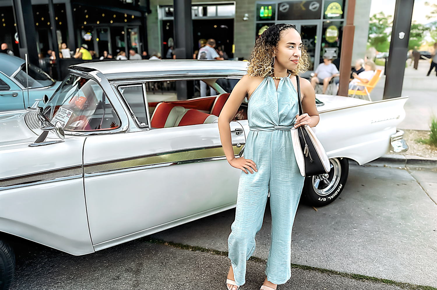 A series of fashion photos taken in front of a vintage white car.