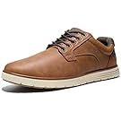 Row of casual brown leather boots and sneakers on white background.