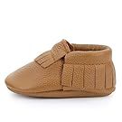 Brown leather baby moccasins and booties arranged in a row.