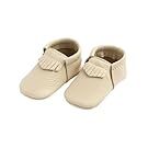 Beige leather baby moccasins and booties arranged in a row.