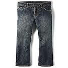 Dark wash denim jeans displayed in various styles and folds.