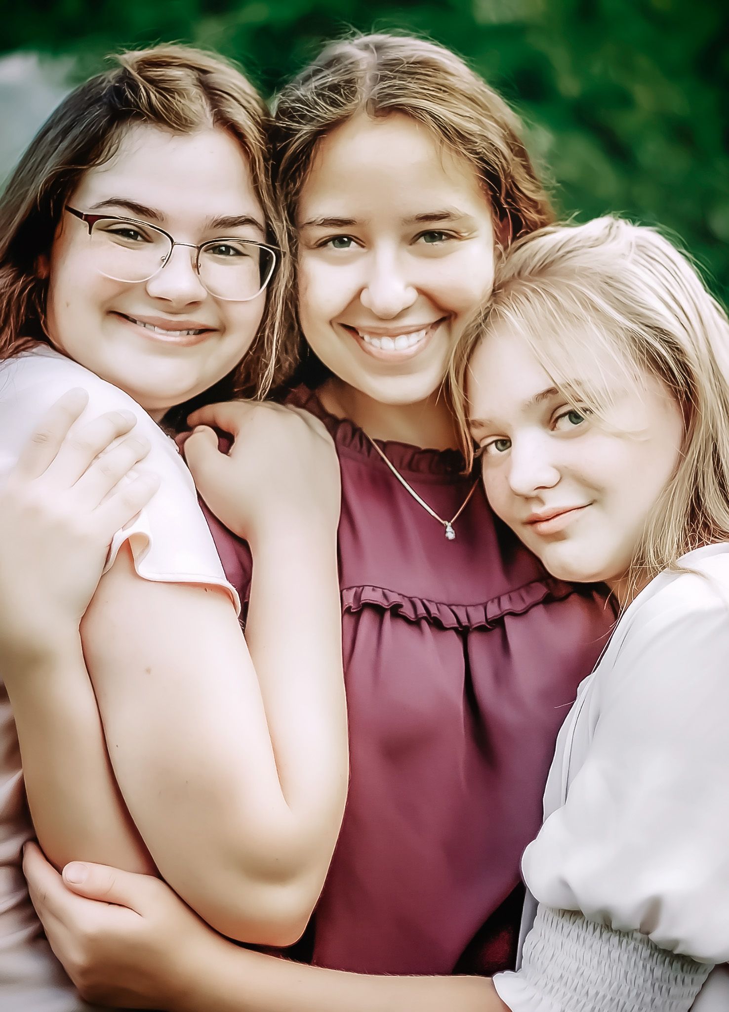 Family portrait session showing close-up smiles and embraces in outdoor setting with natural lighting.