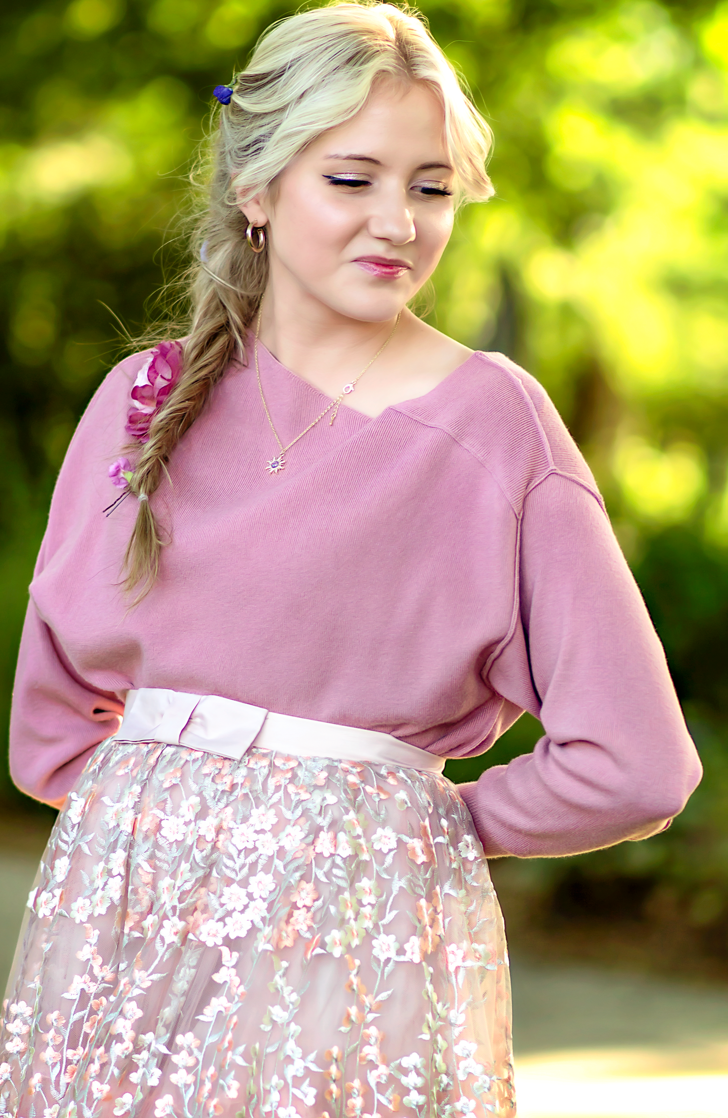 Series of photos showing a dusty rose dress with floral pattern details.