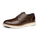 Brown leather oxford dress shoes arranged to show different views and angles.