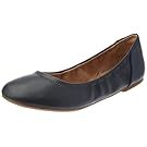 Black and brown leather ballet flats with round toe shown in a row.
