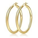 Gold hoop earrings in various sizes displayed in a row.