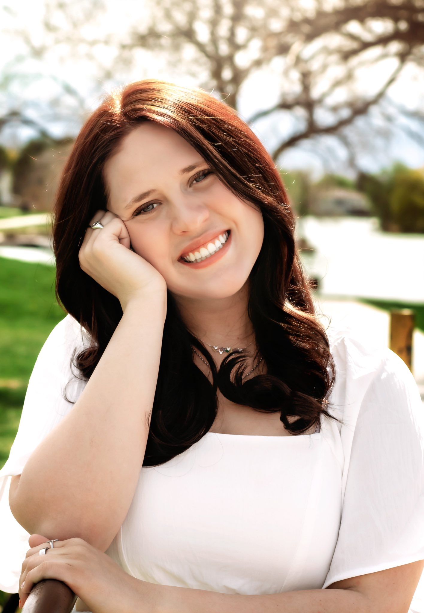 A sequence of casual portraits featuring a white shirt and dark hair against a sunny outdoor setting.