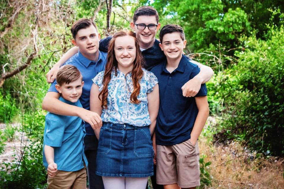 Family group photos taken outdoors with green foliage background.