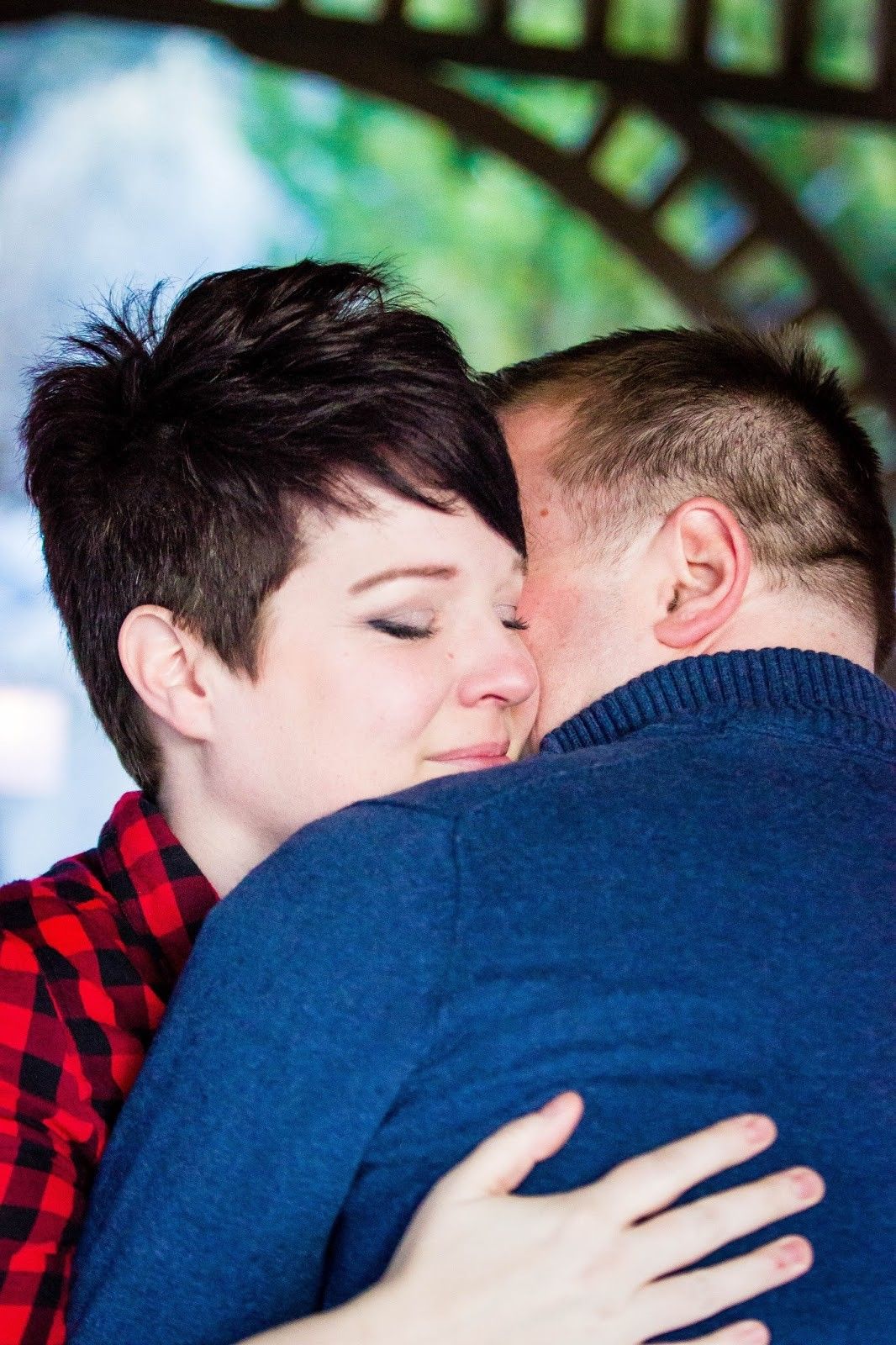 Intimate moment captured between two people embracing in a tender hug.