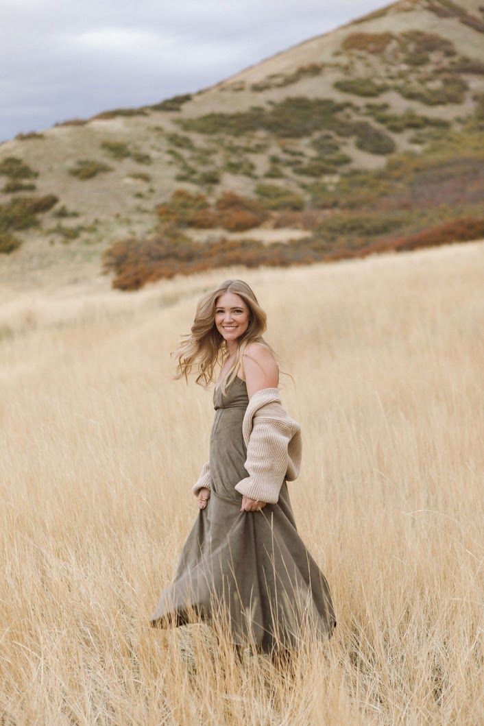 A sequence of carefree moments in a golden wheat field with flowing dresses and natural movement.