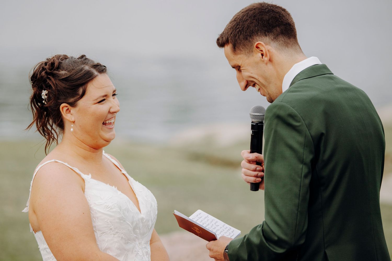Wedding couple sharing intimate moments during their outdoor ceremony.